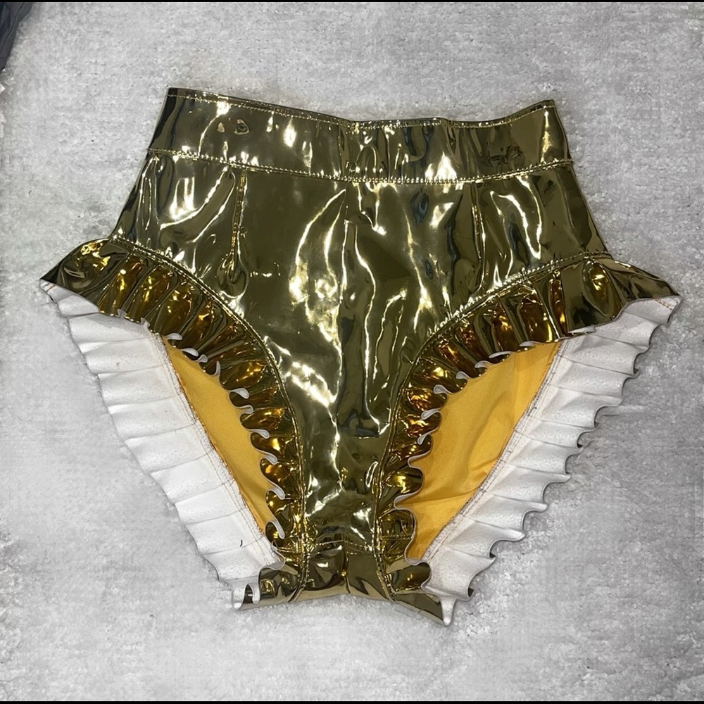 CHARWORKROOM Gold high cut cheeky shorts.